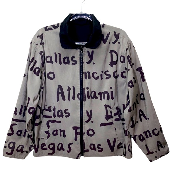 MYCRA PAC 90’s REVERSIBLE CITY GRAPHIC RAIN COAT